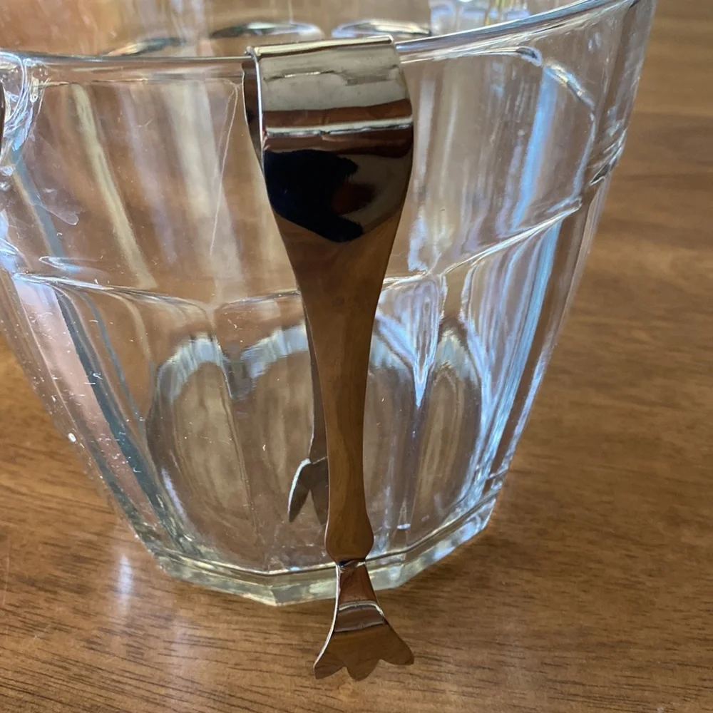 Vintage ice bucket. Mint condition With tongs. 6 3/4 in tall. 7 inches wide.